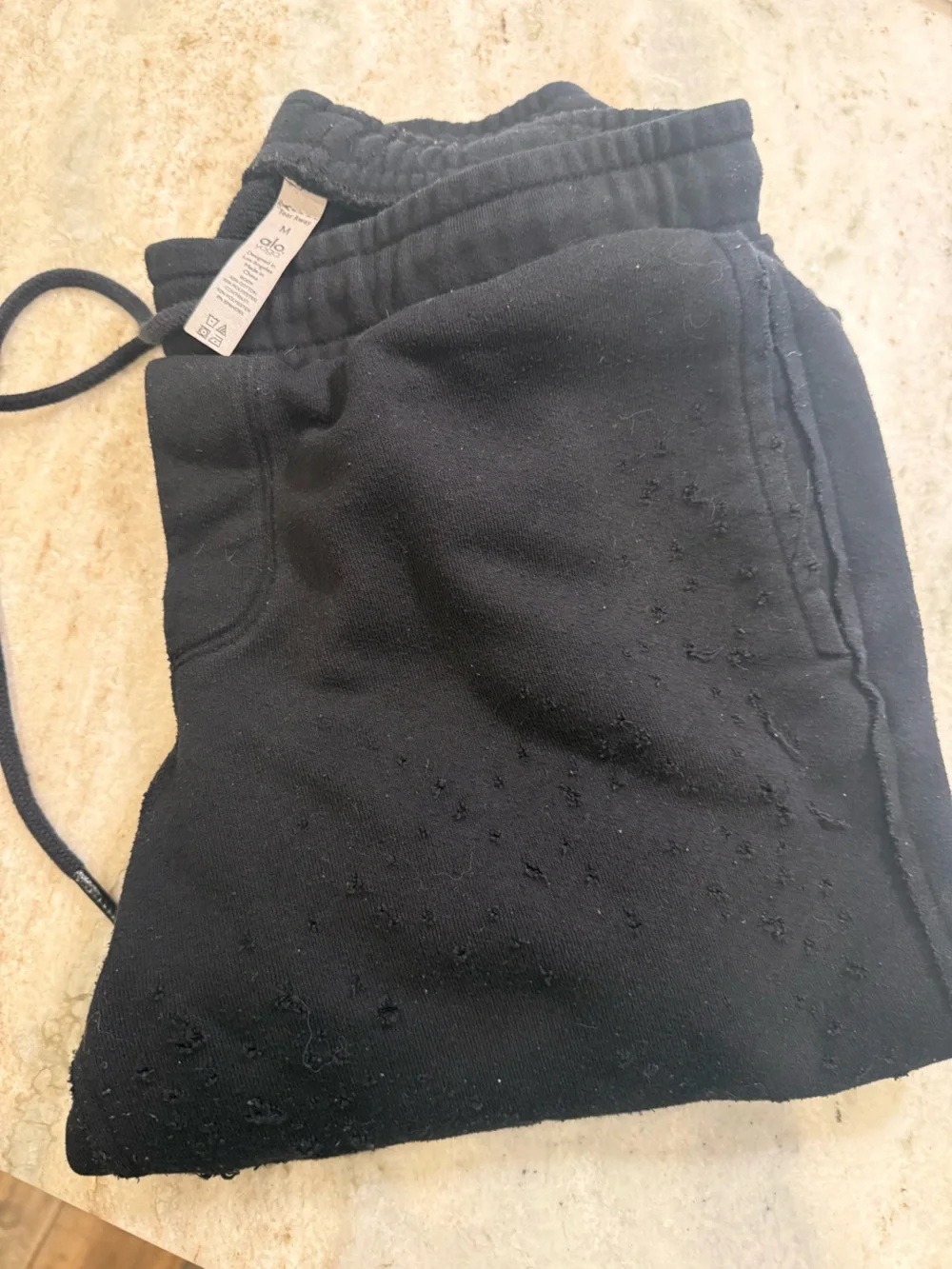 ALO Yoga Black Destroyed Joggers with Subtle Texture Size M